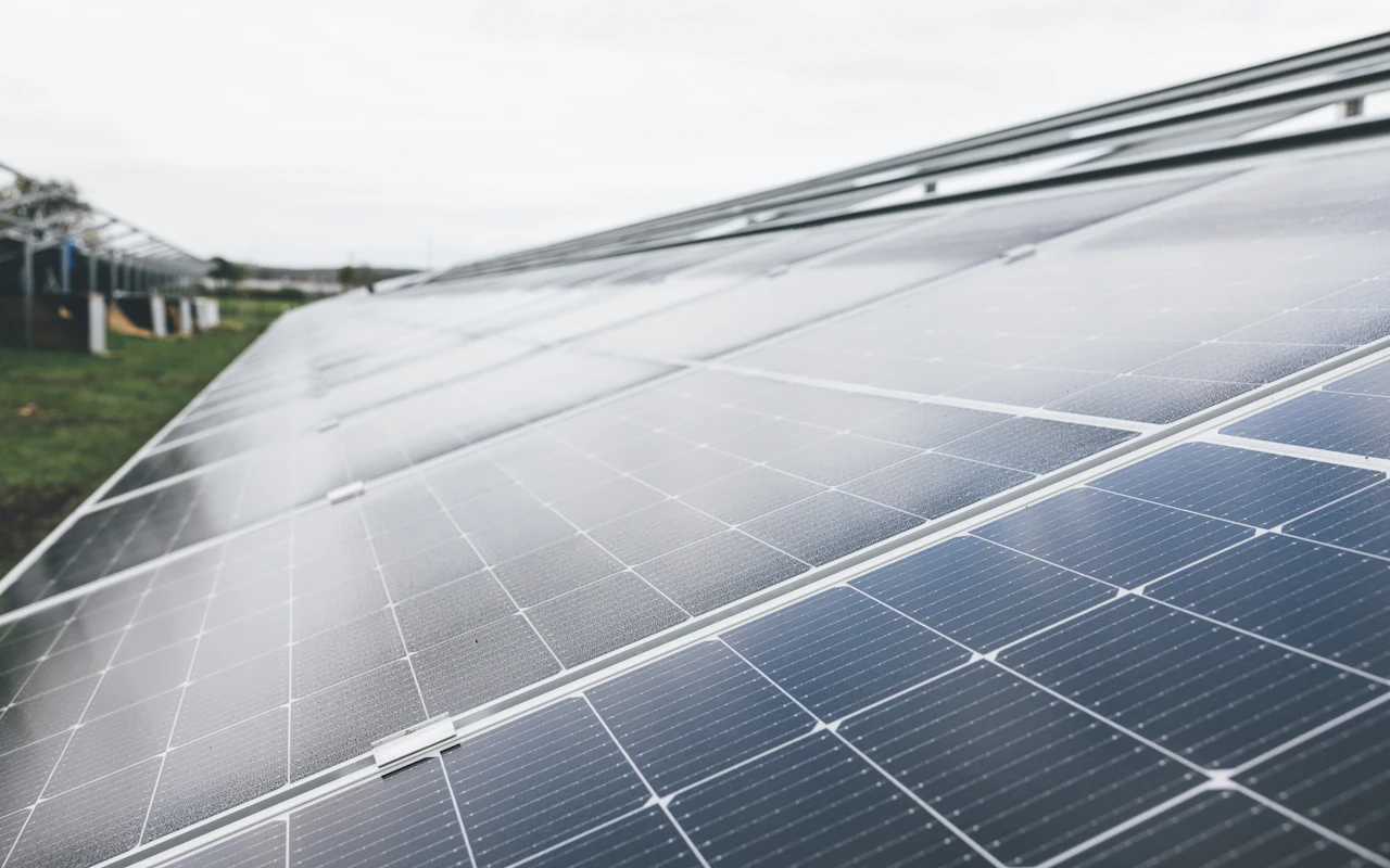 Close-up of solar panels being installed on a roof